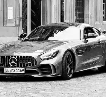 grayscale photo of mercedes benz coupe